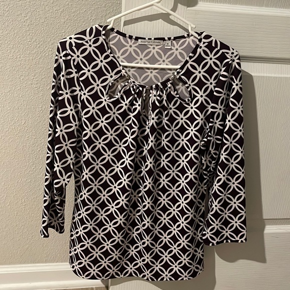 Notations Tops - This is a floral-patterned top by Notations